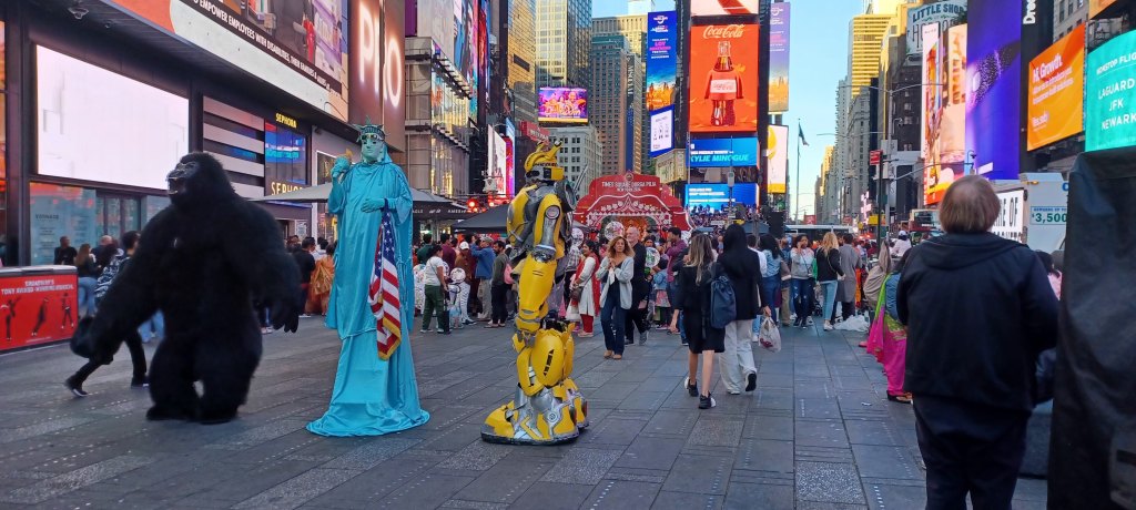 Times Square characters such as Statue of Liberty and Transformer and King Kong at Durga Puja, 2024